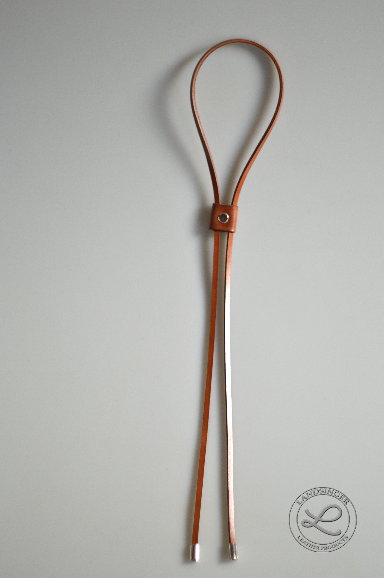 Stahovací řemínek s kovovou koncovkou na kabelku, tašku, batoh - polotovar.