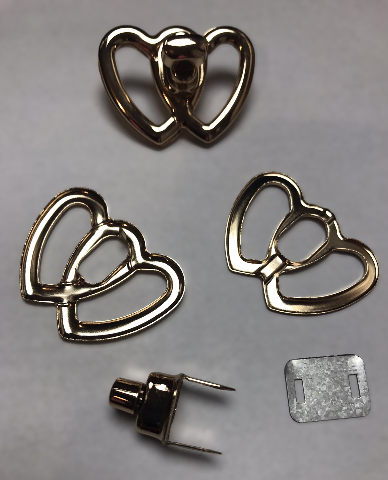 Zapínání na kabelku srdce 48x35 mm.